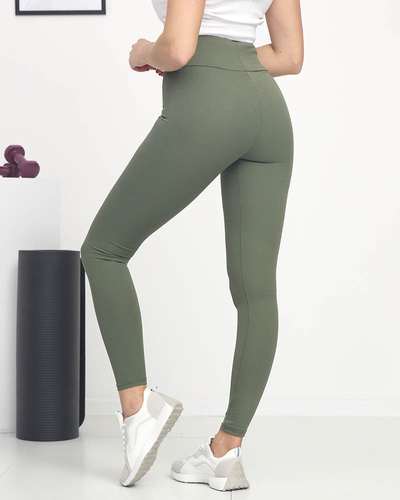 Royalfashion Zielone damskie prążkowane legginsy z pomarańczowymi napisami