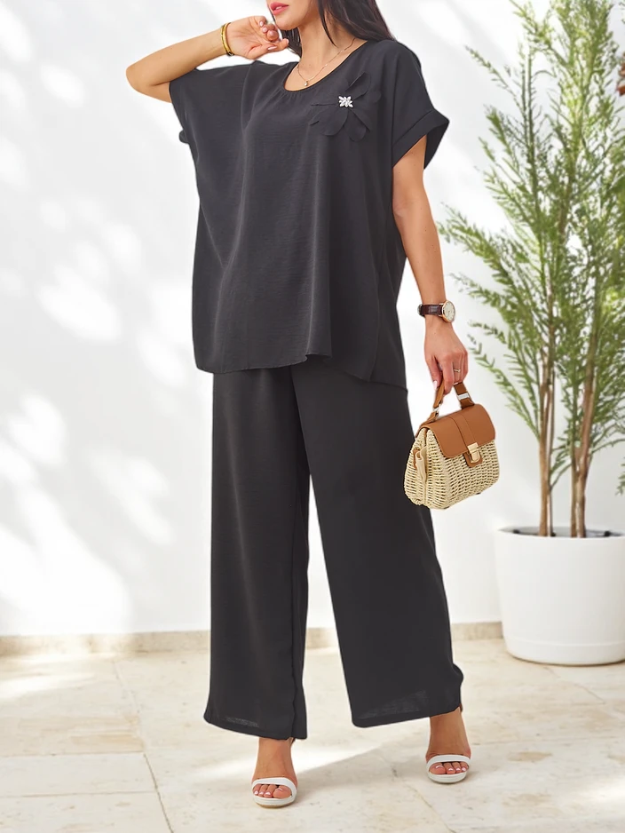 Royalfashion Ženski komplet s kratkimi rokavi, dekorativno cvetje in široke hlače