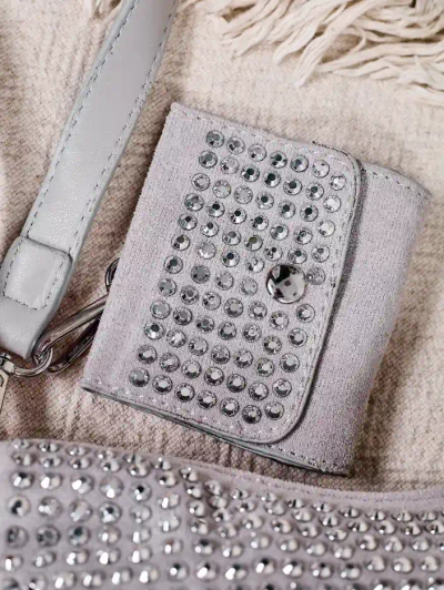 Royalfashion Mala ženska torba s zakovicami