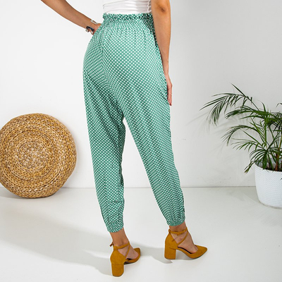 Royalfashion Zielone damskie spodnie materiałowe w groszki PLUS SIZE