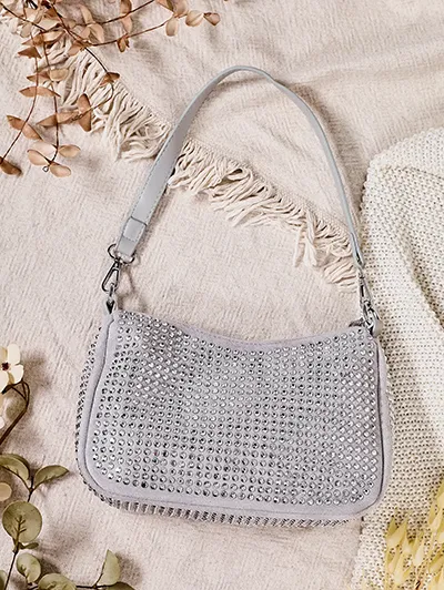 Royalfashion Mala ženska torba s zakovicami