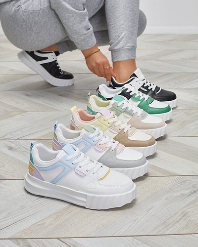 Royalfashion Eko-skórzane damskie czarne casualowe buty sportowe z białymi wstawkami Netiris