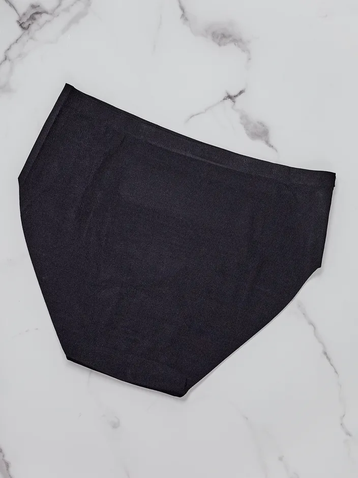 Royalfashion Ženske ribane hlačke z laserskim rezom