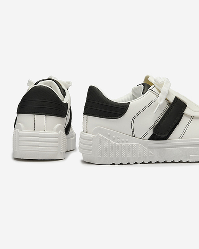 Royalfashion Czarno-białe damskie buty sportowe z gumowymi wstawkami Inika