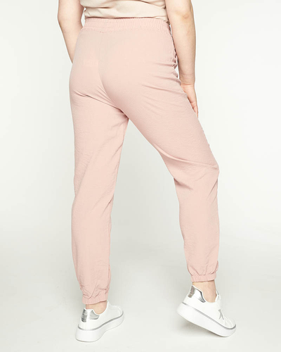 Royalfashion Damskie różowe spodnie materiałowe typu joggery PLUS SIZE