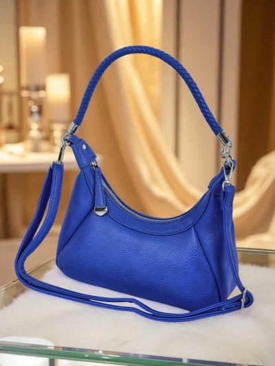 Royalfashion Malá dámska kabelka z ekologickej kože s ozdobným opaskom Lacquea