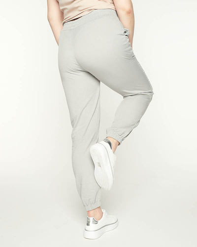 Royalfashion Damskie szare spodnie materiałowe typu joggery PLUS SIZE