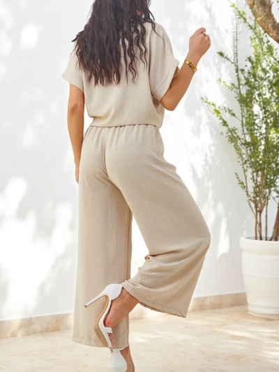 Royalfashion Ženski set s krajšo srajco na vezanje in širokimi hlačami s kristalčki