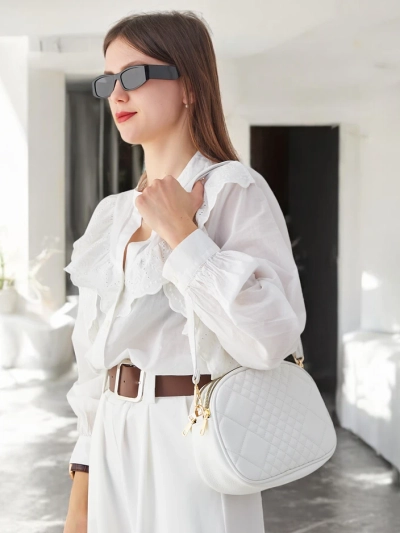 Royalfashion Mala ovalna ženska torbica iz ekološke kože