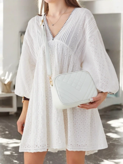 Royalfashion Mala ženska torbica iz ekološke kože z embosiranjem