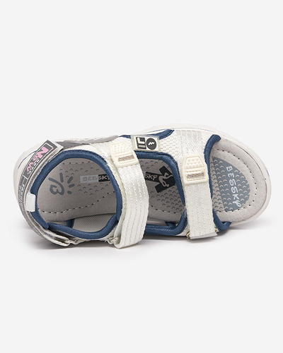 Royalfashion Białe dziecięce sandałki z naszywkami Kiteks