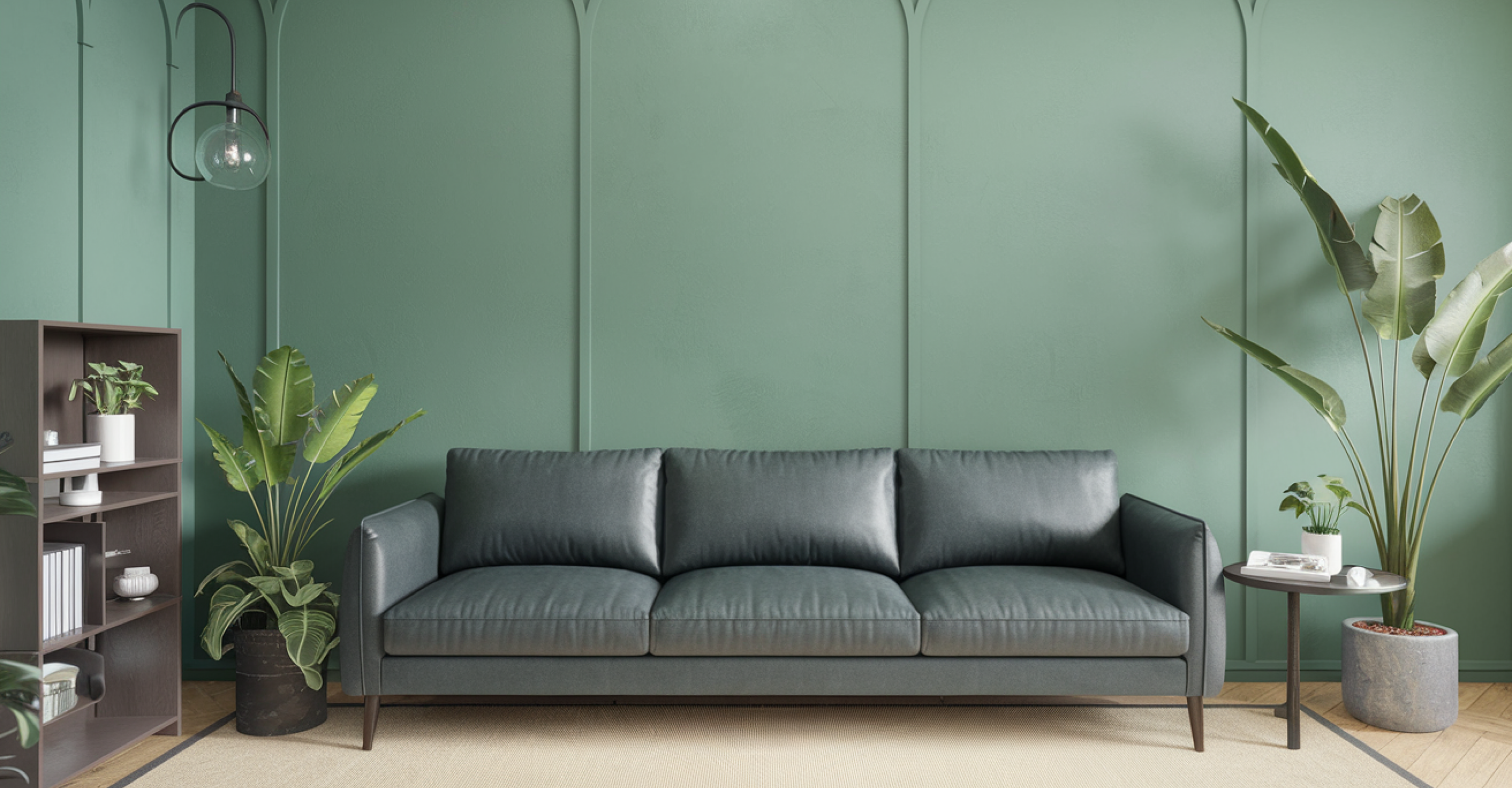 Living room with dark green three-seater sofa